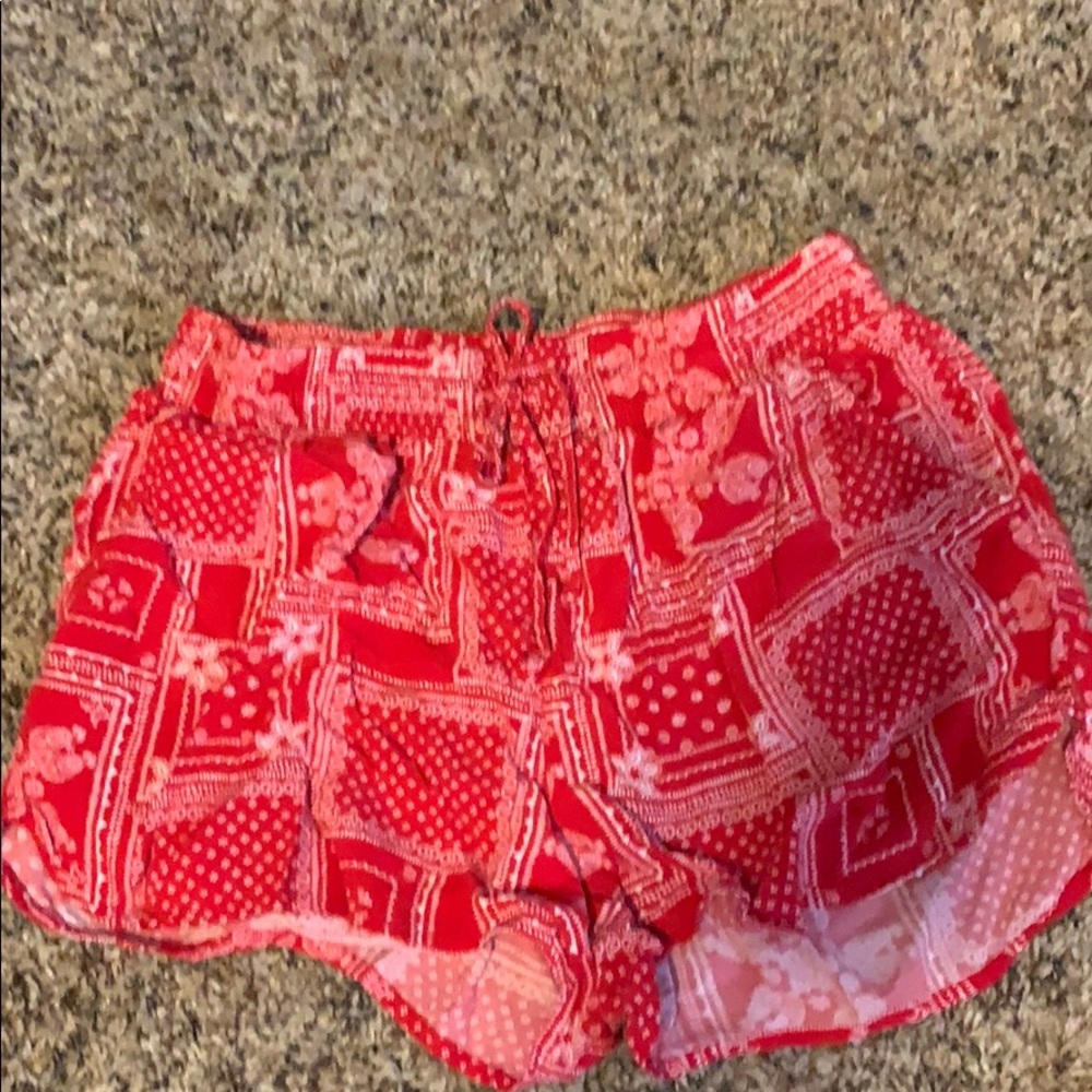 red shorts